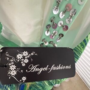 Elegant Green and Blue Maxi Dress with peacock Theme